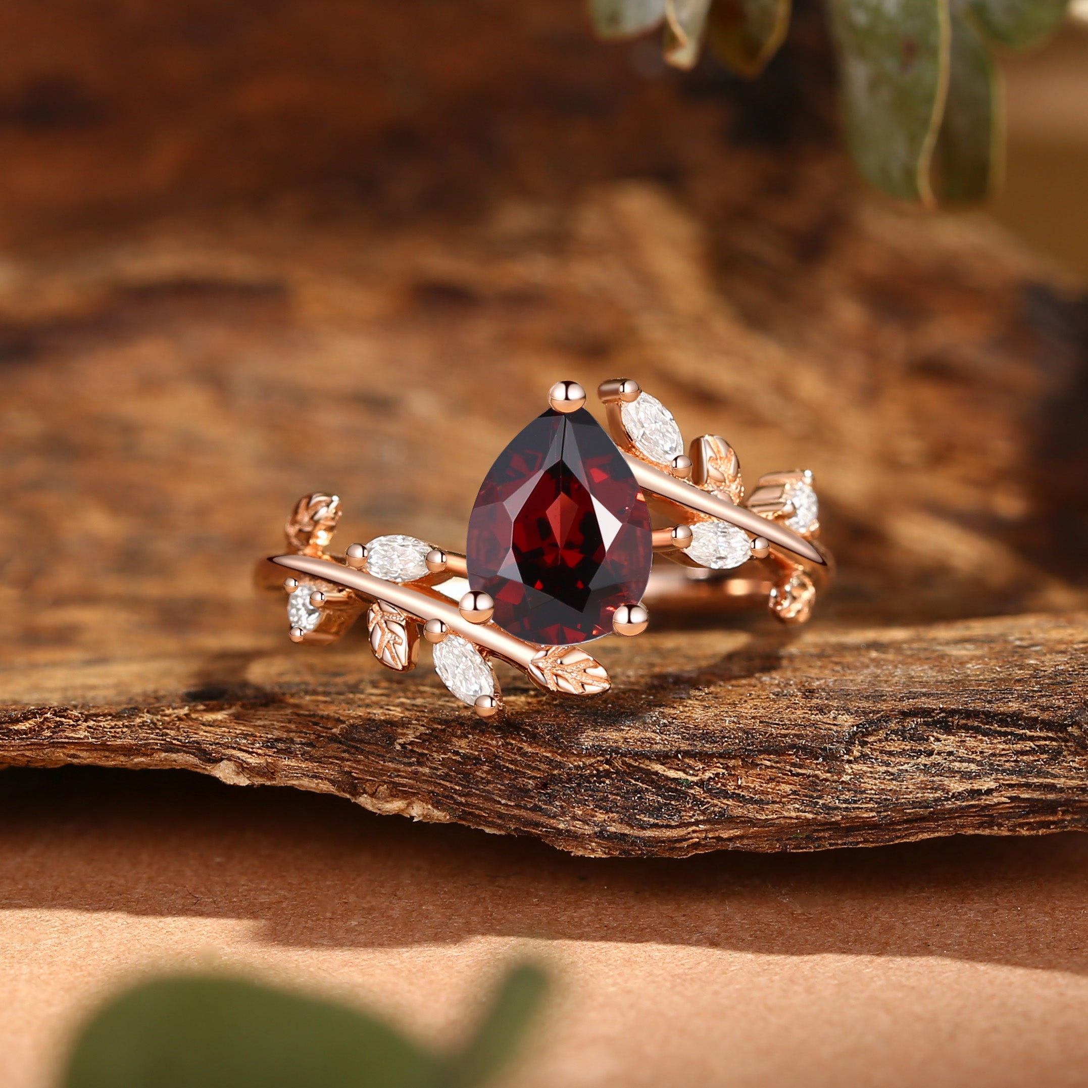 Clarissa - Pear Cut Garnet Branch Leafy Inspired Engagement Ring