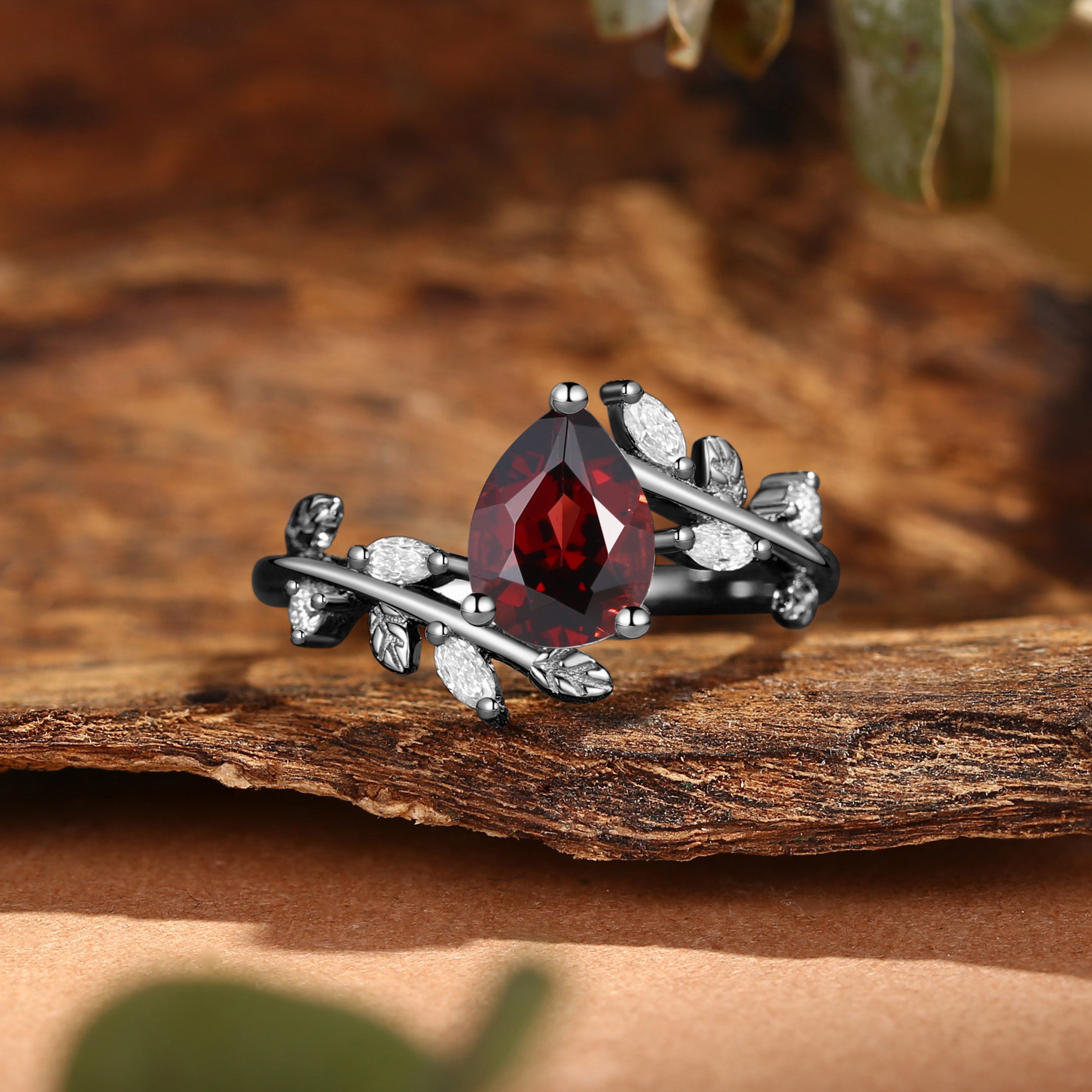 Clarissa - Pear Cut Garnet Branch Leafy Inspired Engagement Ring