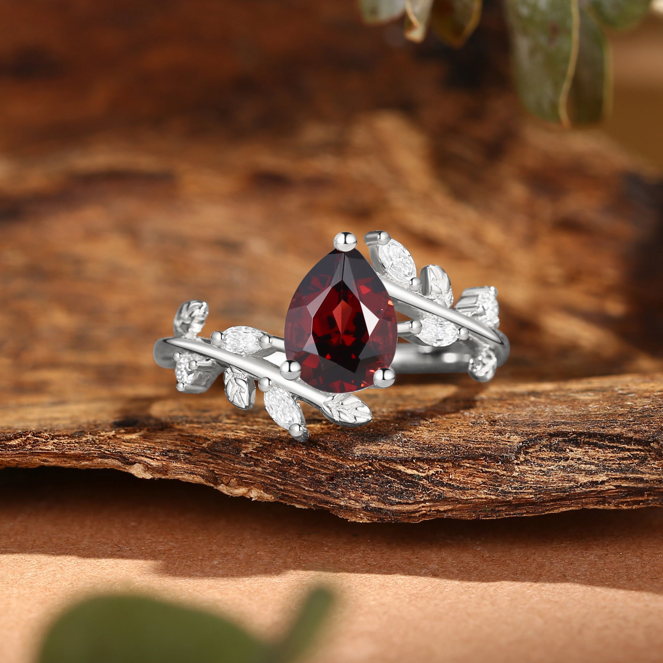 Clarissa - Pear Cut Garnet Branch Leafy Inspired Engagement Ring