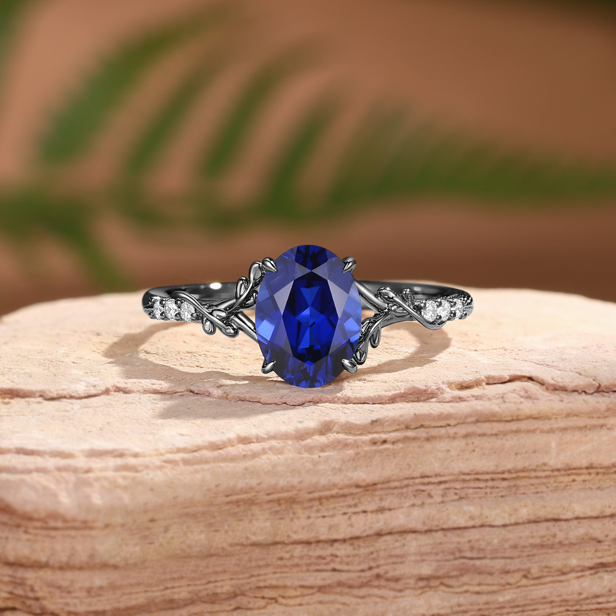 Drisana - Black Gold Oval Cut Sapphire Leaf Curved Engagement Ring