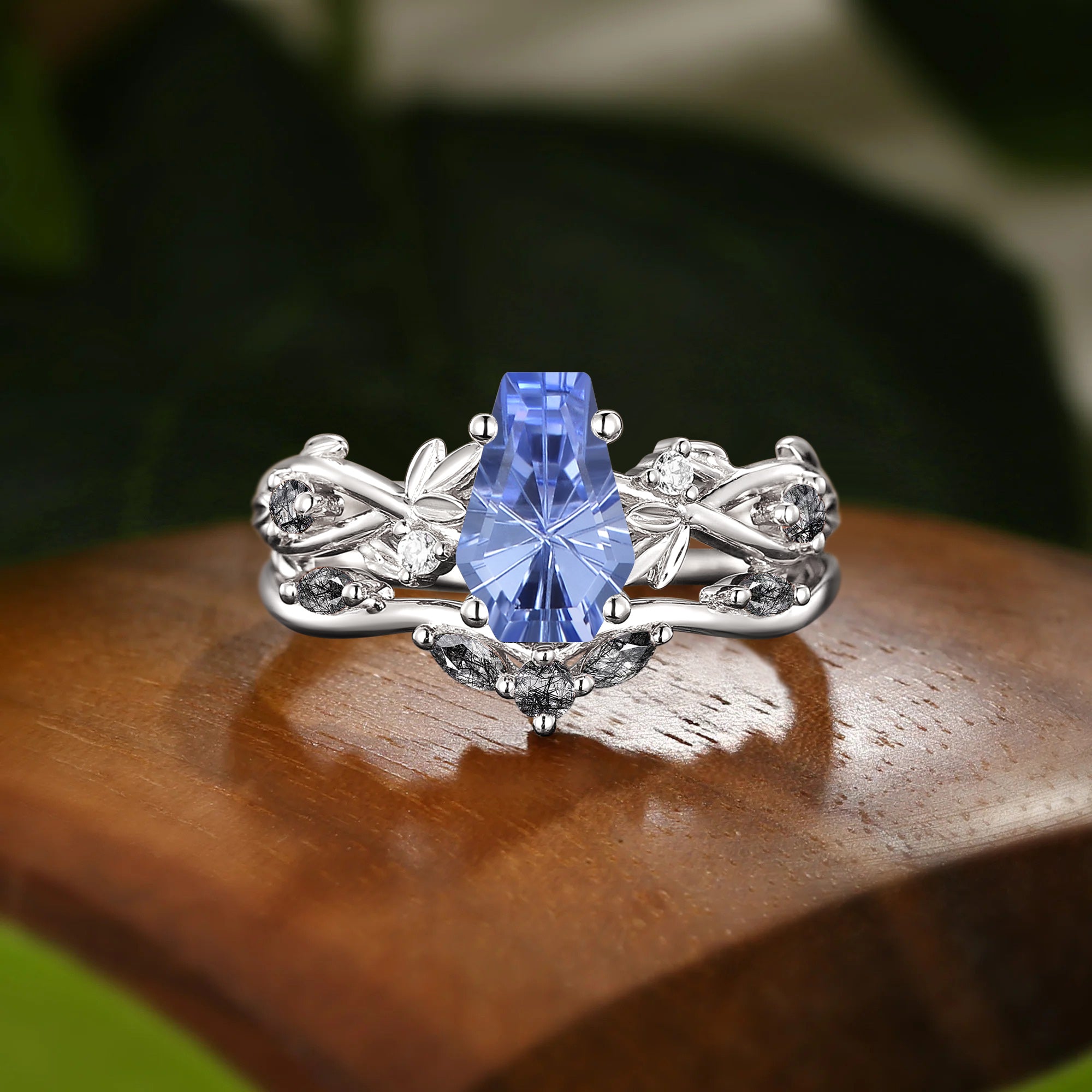 Celeste - Firework Coffin Cut Cornflower Blue Sapphire Leafy Twist Bridal Set 2pcs