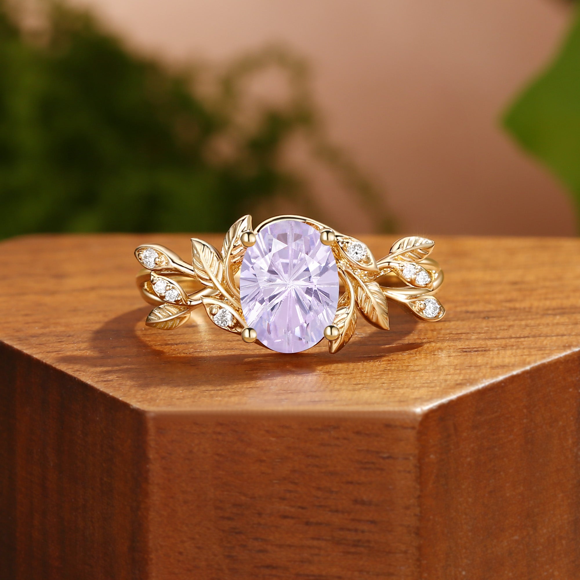 Yolande- Firework Portrait Oval Cut Purple Sapphire Leafy Engagement Ring