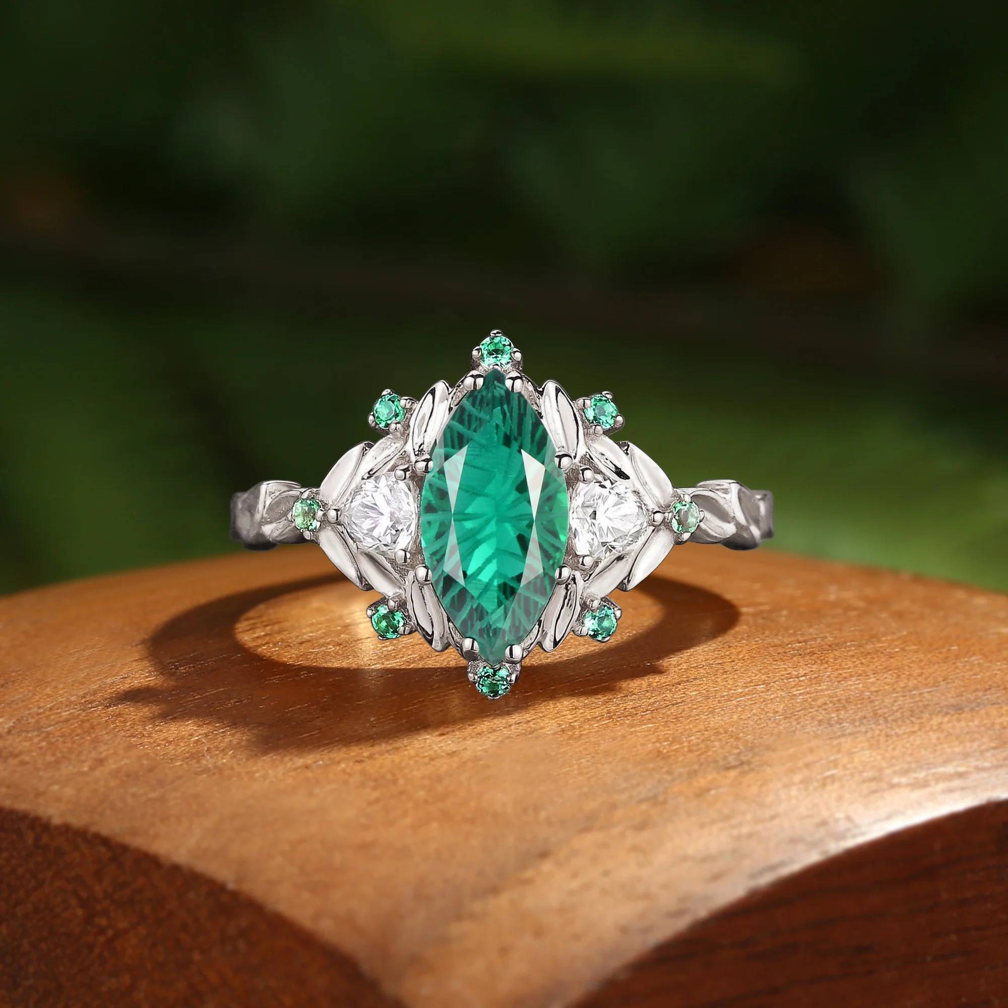Jessamine -  Firework Cut Marquise Lab Emerald Leaf Three Stone Branch Engagement Ring