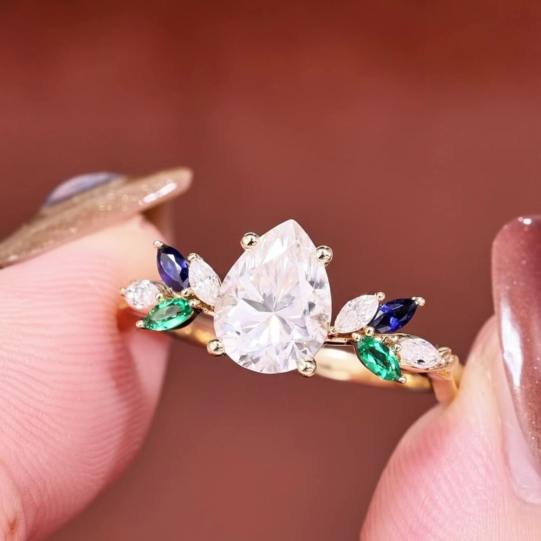 Load video: Abella - Pear Cut Moissanite &amp; Sapphire &amp; Emerald Butterfly Engagement Ring